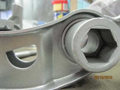 Close up of Mopar lower control arm in Alien Silver